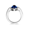 Ring entourage wit goud met Ceylon saffier en diamant